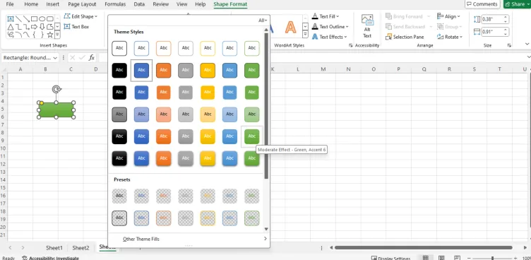 Tab Shape Format dengan galeri Quick Style untuk mewarnai bentuk
